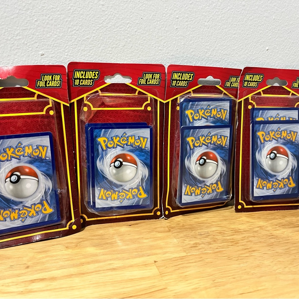 Pokemon Trading Cards - NEW 4 Packs
